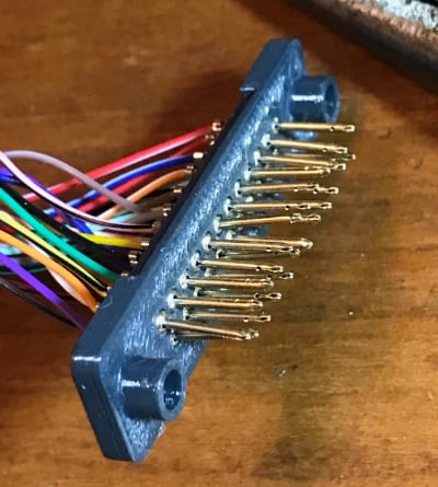 Pins push into back assembly